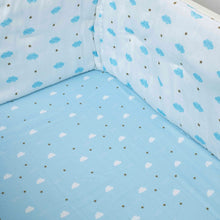 Load image into Gallery viewer, Blue Clouds Theme Organic Fitted Cot Sheet
